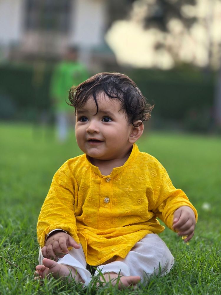 Baby in yellow kurta