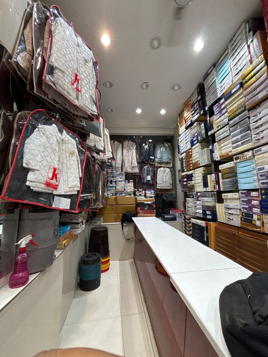 Inside Banti Babli Collection, shelves of packed kids suits